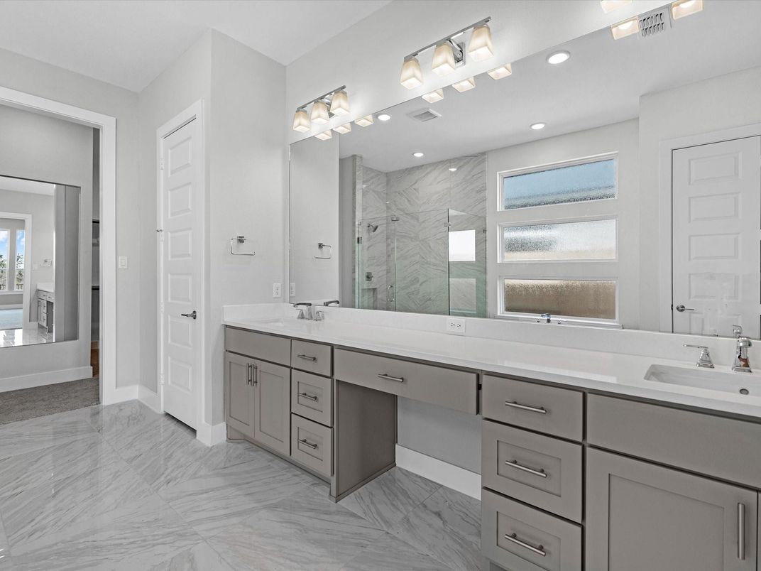 Bathroom, Dual Sink Vanities, Glass Shower, Interior, Marble, Marble Walls, Recessed Lighting