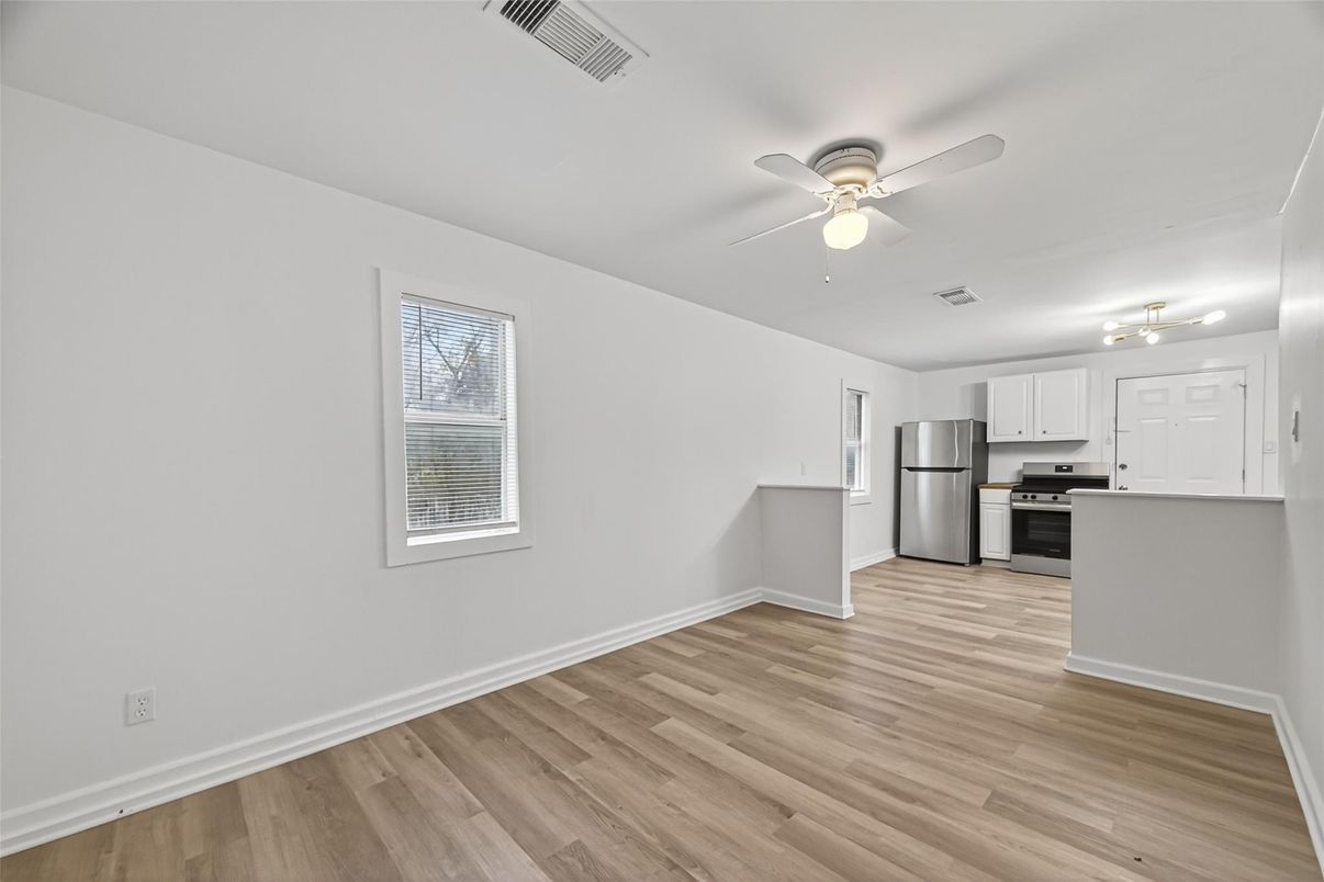 Empty room, Interior, Kitchen, Stainless Steel Appliances, Wood Texture Flooring