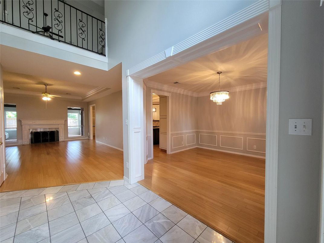 Empty room, Fireplace, Interior, Marble, Pendant Lights, Recessed Lighting, Wood Texture Flooring