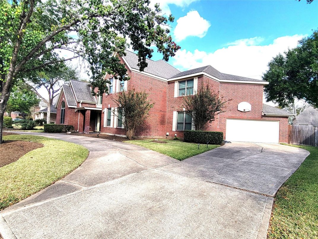 Attached, Exterior, Facade, Brick Facade, Tudor Revival