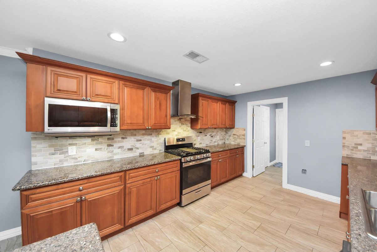 Interior, Kitchen, Recessed Lighting, Stainless Steel Appliances, Wood Texture Flooring