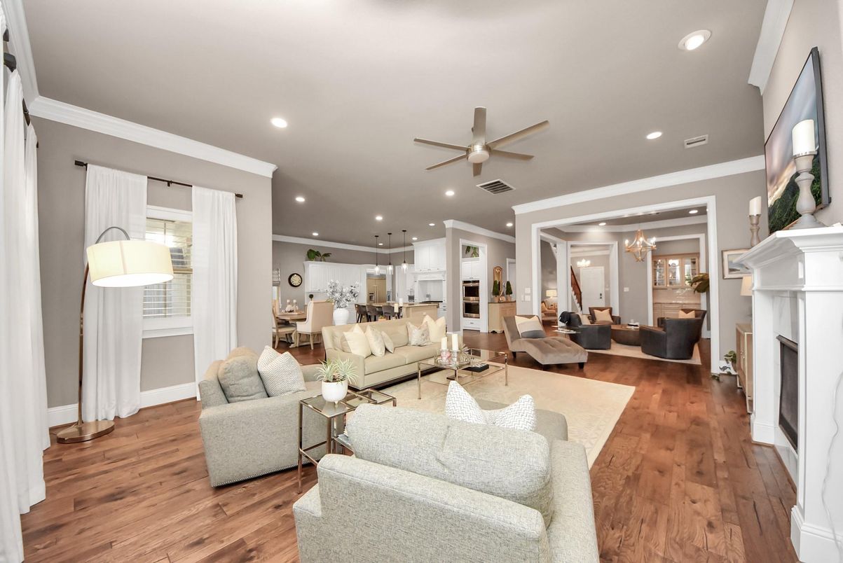 Chandelier, Dining room, Fireplace, Interior, Living room, Pendant Lights, Recessed Lighting, Wood Texture Flooring