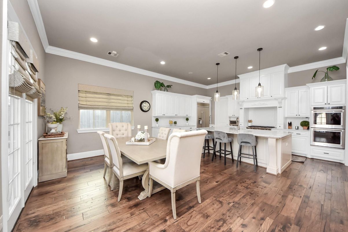 Dining room, Interior, Kitchen, Pendant Lights, Recessed Lighting, Stainless Steel Appliances, Wood Texture Flooring