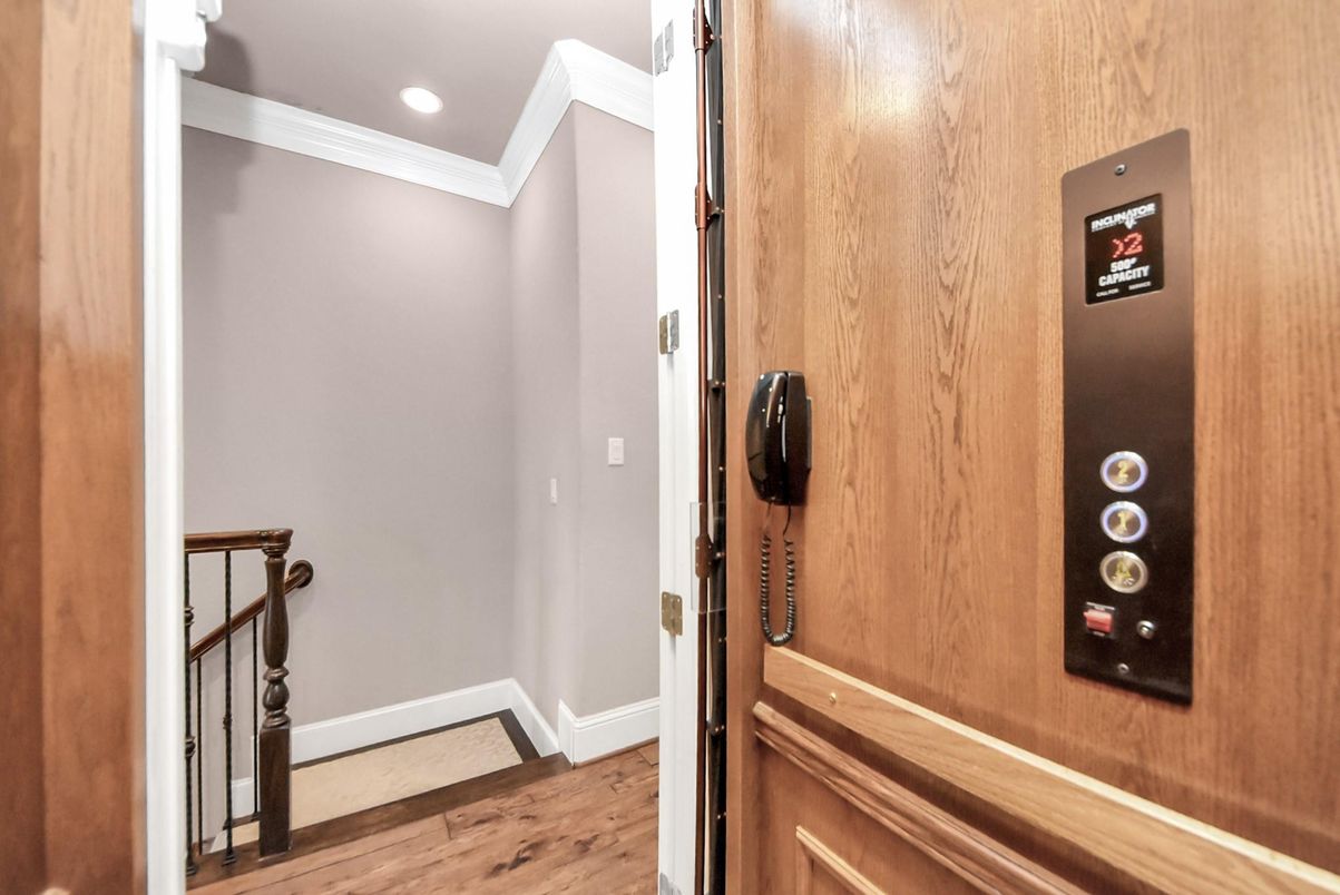 Elevator, Interior, Recessed Lighting, Wood Texture Flooring, Wooden Walls