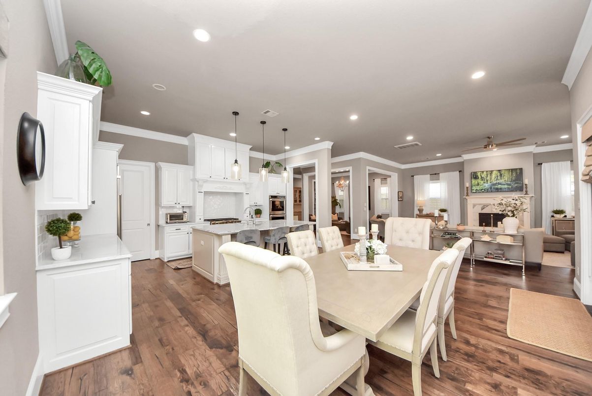 Dining room, Fireplace, Interior, Kitchen, Living room, Pendant Lights, Recessed Lighting, Stainless Steel Appliances, Wood Texture Flooring