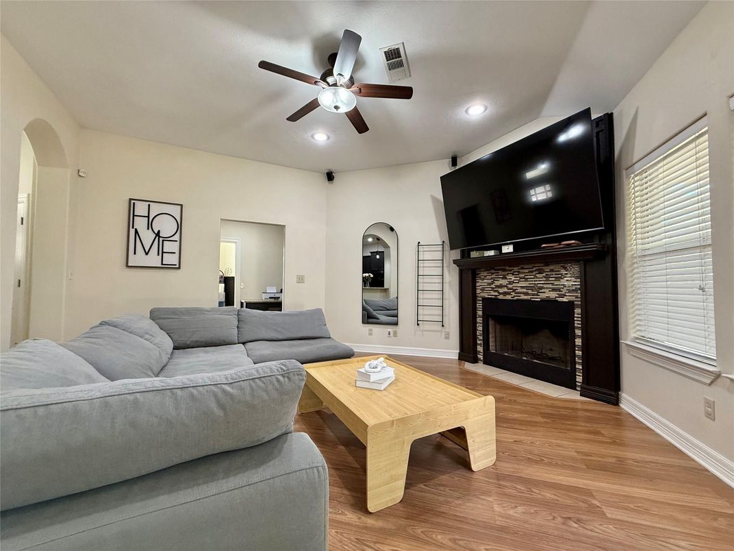 Fireplace, Interior, Living room, Recessed Lighting, Wood Texture Flooring