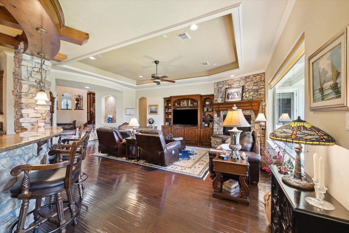 Dining room, Interior, Living room, Recessed Lighting, Stone Walls, Wood Texture Flooring