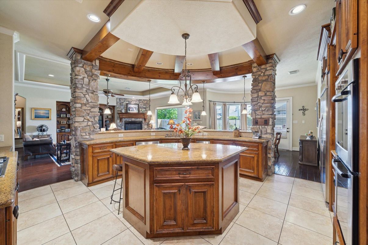 Chandelier, Dining room, Fireplace, Interior, Kitchen, Living room, Pendant Lights, Recessed Lighting, Wooden Beams, Wood Texture Flooring