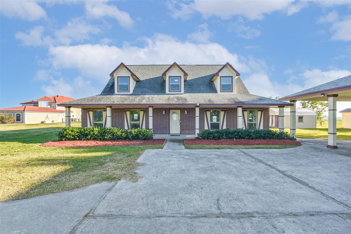 Exterior, Facade, Brick Facade, Cape Cod