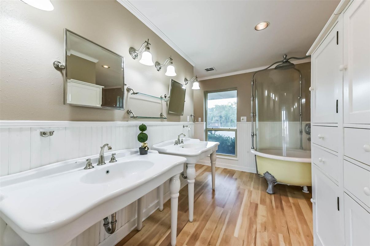 Bathroom, Dual Sink Vanities, Free Standing Baths, Glass Shower, Interior, Recessed Lighting, Wood Texture Flooring