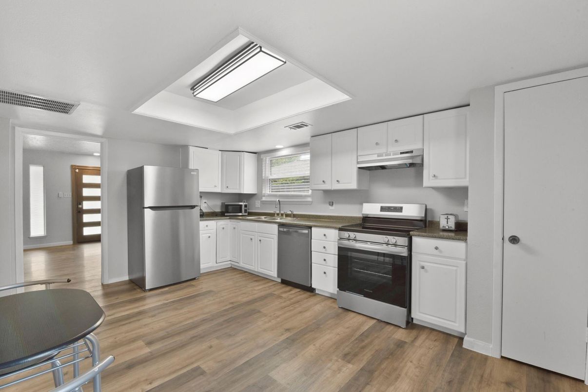 Interior, Kitchen, Recessed Lighting, Stainless Steel Appliances, Wood Texture Flooring