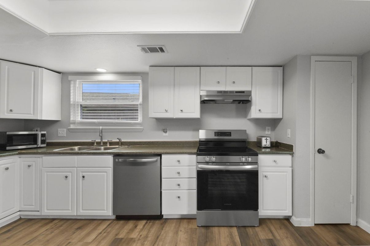 Interior, Kitchen, Recessed Lighting, Stainless Steel Appliances, Wood Texture Flooring