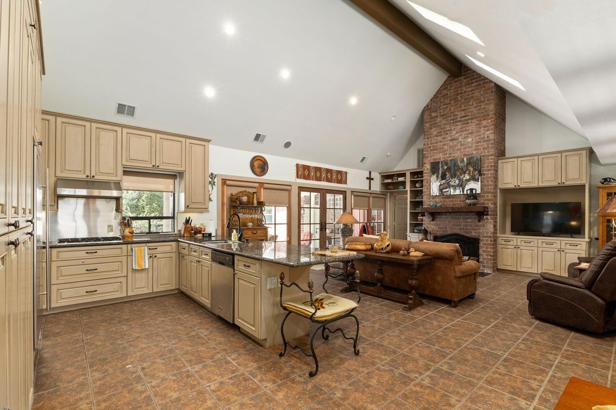 Fireplace, Interior, Kitchen, Living room, Recessed Lighting, Stone Walls