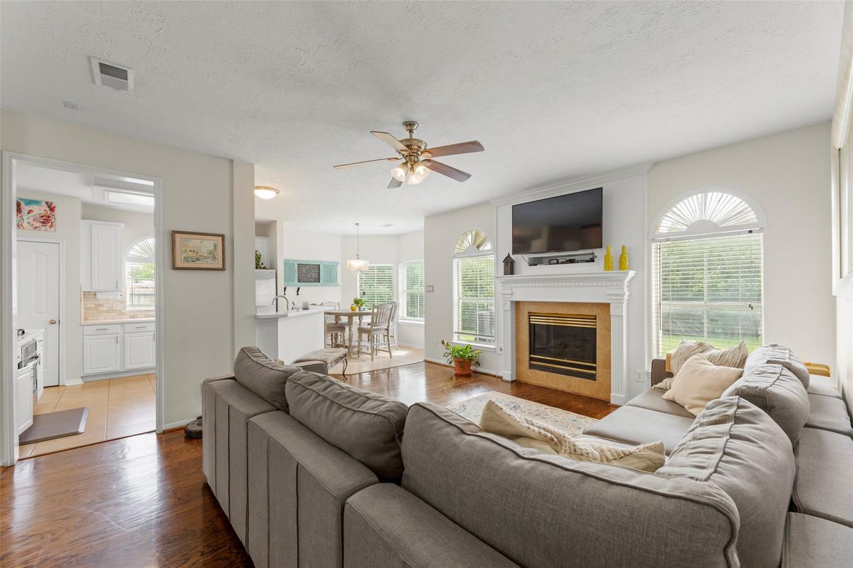 Dining room, Fireplace, Interior, Kitchen, Living room, Pendant Lights, Wood Texture Flooring