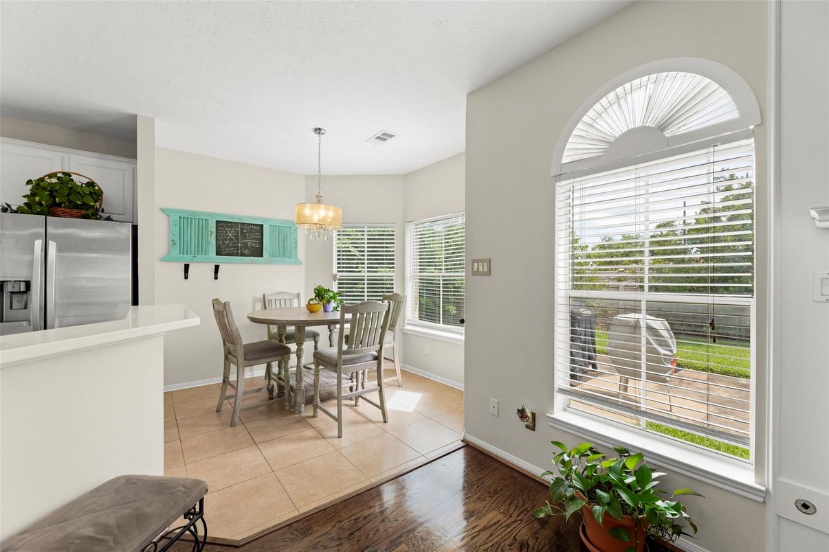 Dining room, Interior, Kitchen, Pendant Lights, Stainless Steel Appliances, Wood Texture Flooring