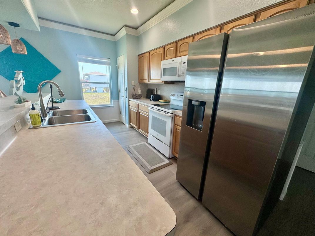 Interior, Kitchen, Recessed Lighting, Stainless Steel Appliances, Wood Texture Flooring