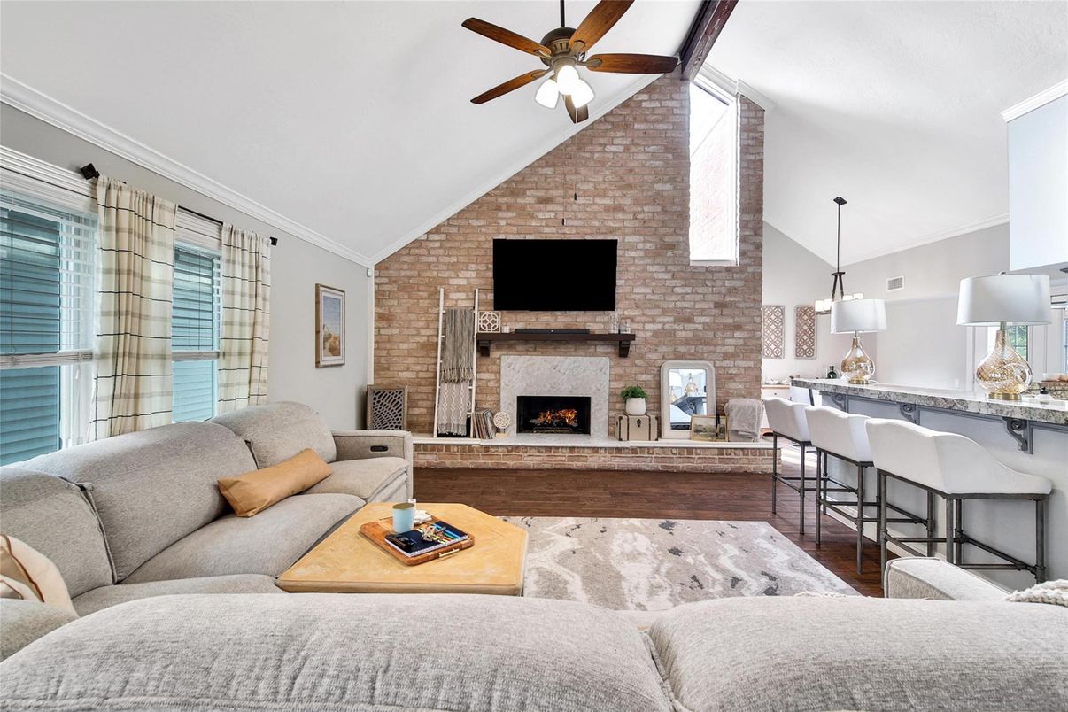 Dining room, Fireplace, Interior, Living room, Pendant Lights, Stone Walls, Wood Texture Flooring