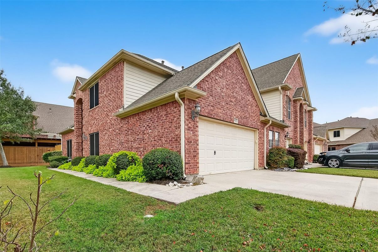 Attached, Exterior, Facade, Brick Facade, Brick Traditional