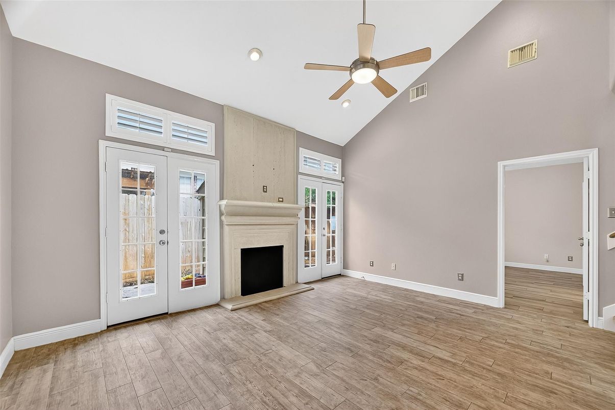 Empty room, Fireplace, Interior, Recessed Lighting, Wood Texture Flooring