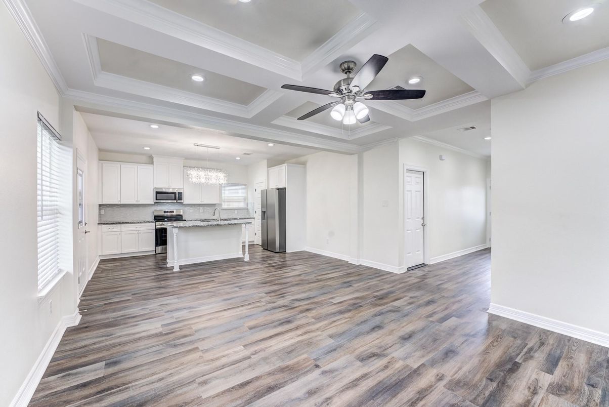 Chandelier, Empty room, Interior, Kitchen, Recessed Lighting, Stainless Steel Appliances, Wood Texture Flooring