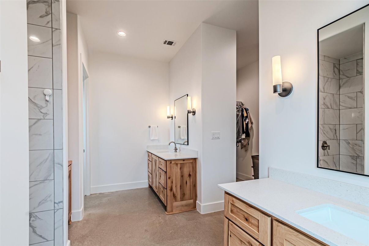 Bathroom, Dual Sink Vanities, Interior, Marble Walls, Recessed Lighting