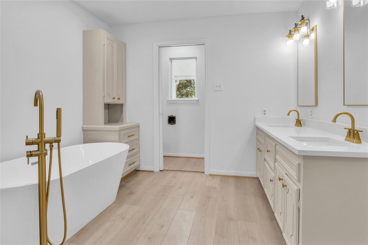 Bathroom, Dual Sink Vanities, Free Standing Baths, Interior, Wood Texture Flooring