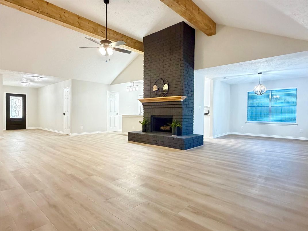 Chandelier, Empty room, Fireplace, Interior, Stone Walls, Wooden Beams, Wood Texture Flooring