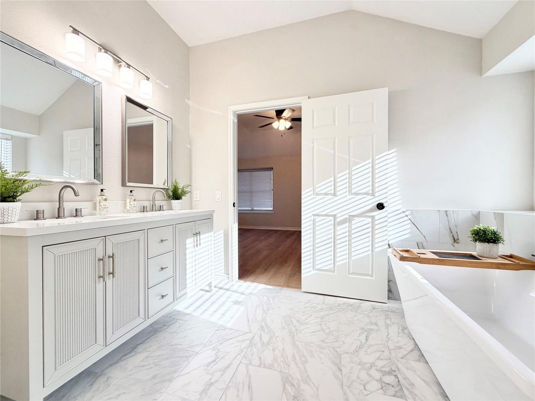 Bathroom, Dual Sink Vanities, Free Standing Baths, Interior, Marble, Wood Texture Flooring
