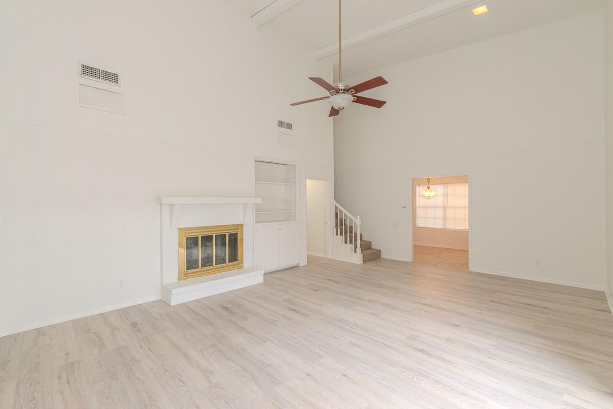 Empty room, Fireplace, Interior, Recessed Lighting, Wood Texture Flooring
