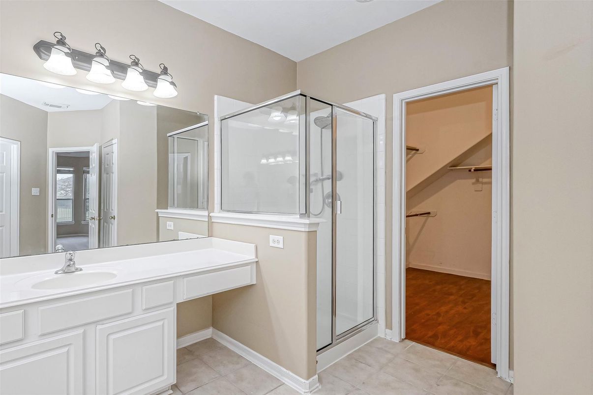 Bathroom, Dual Sink Vanities, Glass Shower, Interior, Walk-in Closets, Wood Texture Flooring