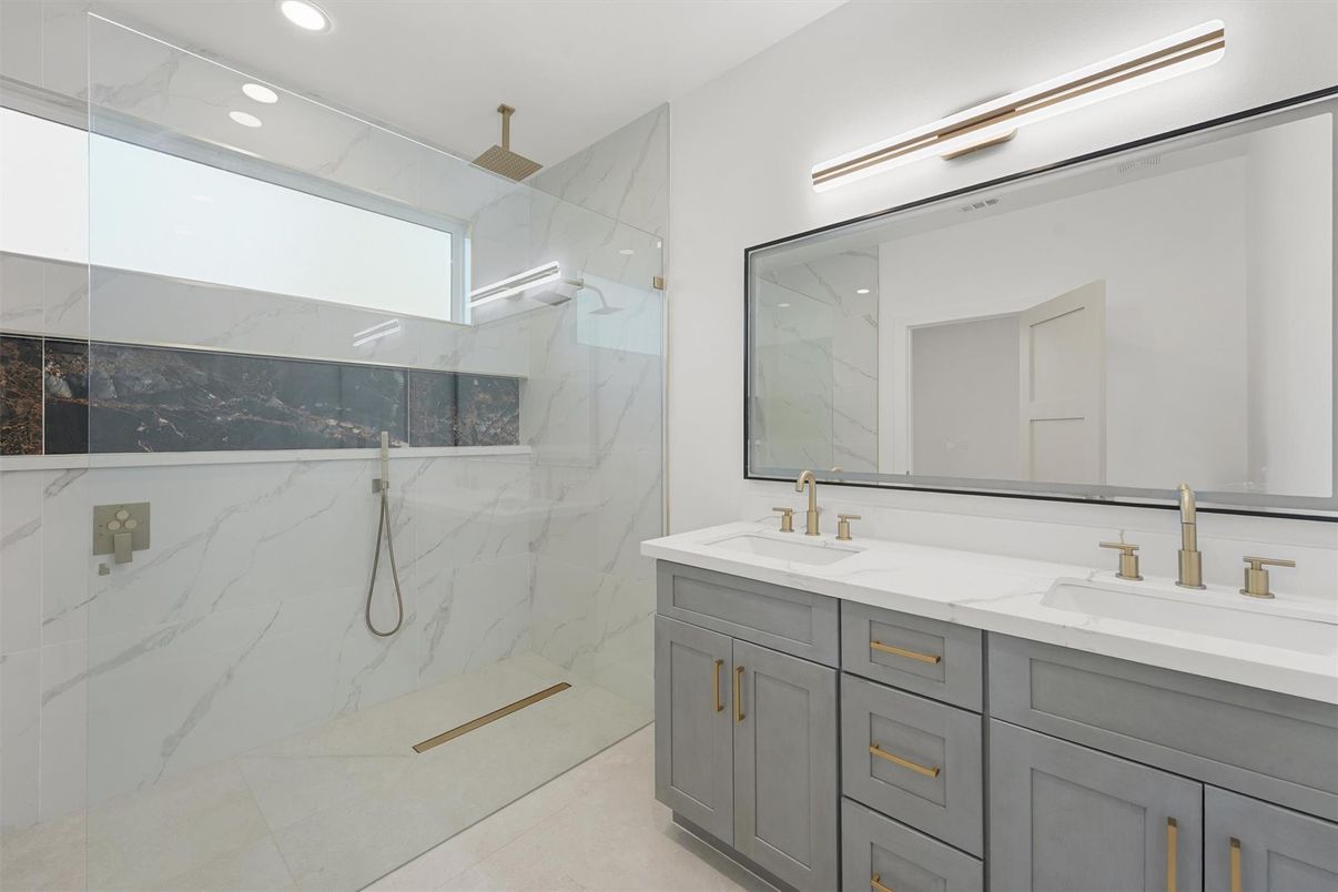 Bathroom, Dual Sink Vanities, Glass Shower, Interior, Marble Walls, Recessed Lighting