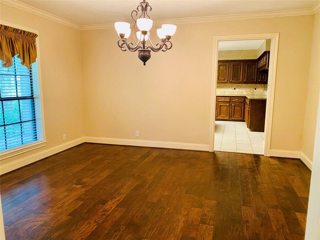 Chandelier, Empty room, Interior, Kitchen, Tile Countertops, Wood Texture Flooring