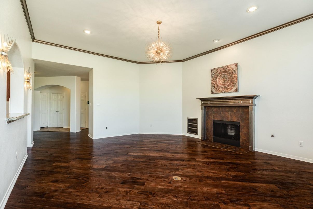 Empty room, Fireplace, Interior, Pendant Lights, Recessed Lighting, Wood Texture Flooring