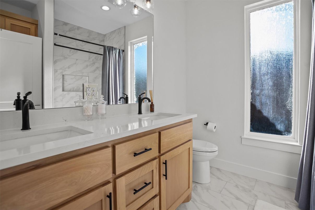 Bathroom, Dual Sink Vanities, Interior, Marble, Marble Walls, Recessed Lighting
