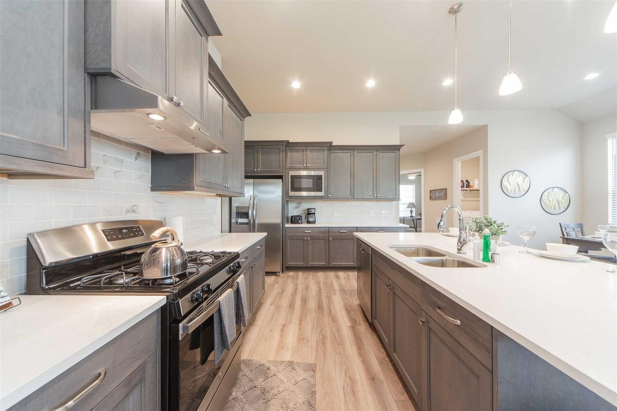 Interior, Kitchen, Pendant Lights, Recessed Lighting, Stainless Steel Appliances, Wood Texture Flooring