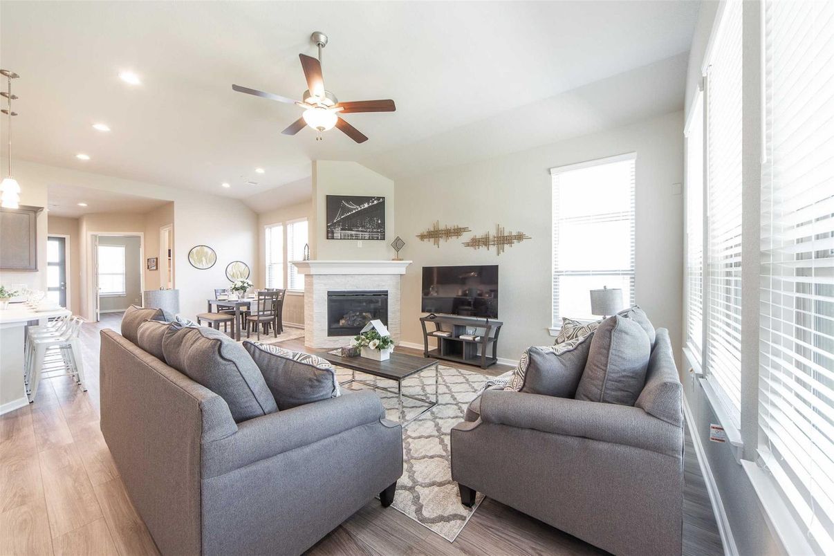 Dining room, Fireplace, Interior, Living room, Pendant Lights, Recessed Lighting, Wood Texture Flooring