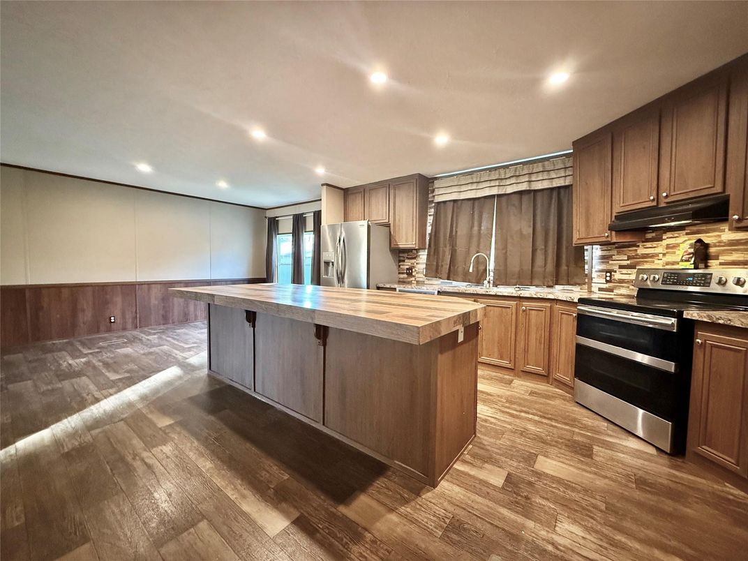 Interior, Kitchen, Recessed Lighting, Stainless Steel Appliances, Wood Texture Flooring