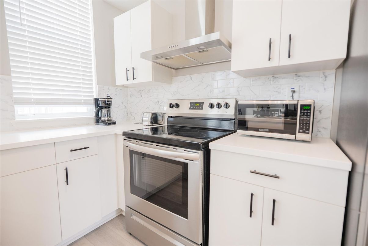 Interior, Kitchen, Marble Walls, Stainless Steel Appliances, Wood Texture Flooring