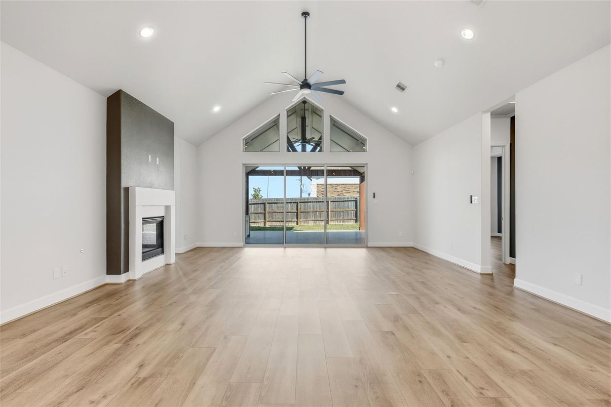 Empty room, Fireplace, Interior, Recessed Lighting, Wood Texture Flooring