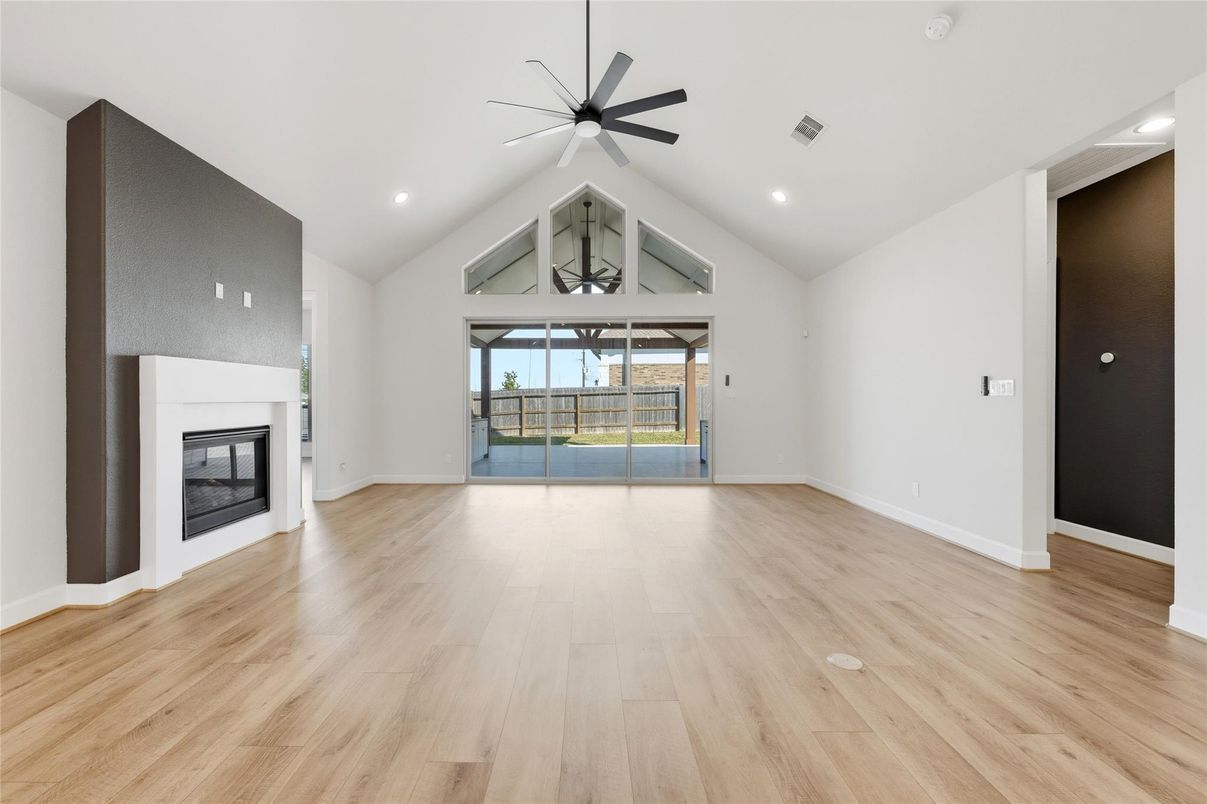 Empty room, Fireplace, Interior, Recessed Lighting, Wood Texture Flooring