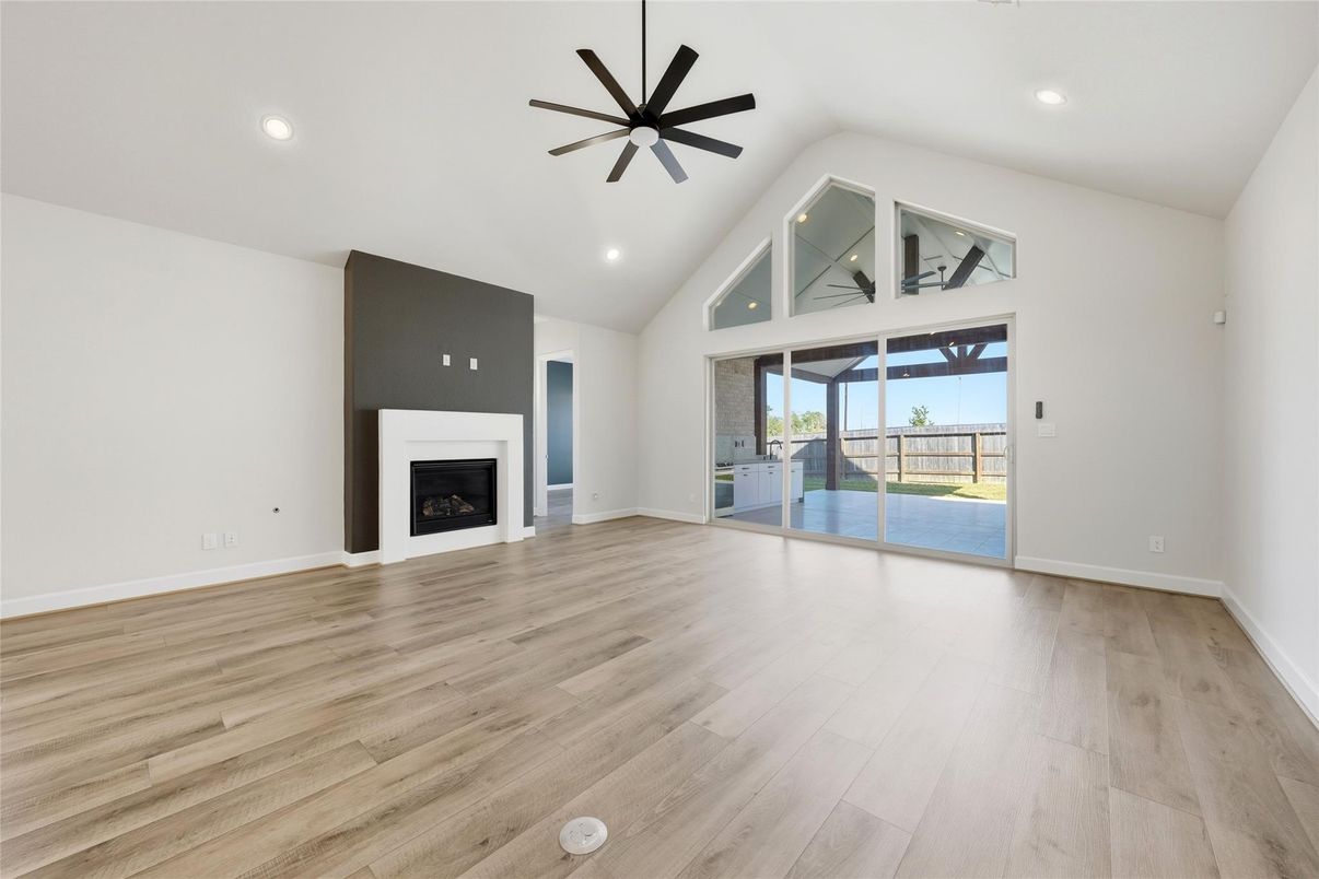 Empty room, Fireplace, Interior, Pendant Lights, Recessed Lighting, Wood Texture Flooring