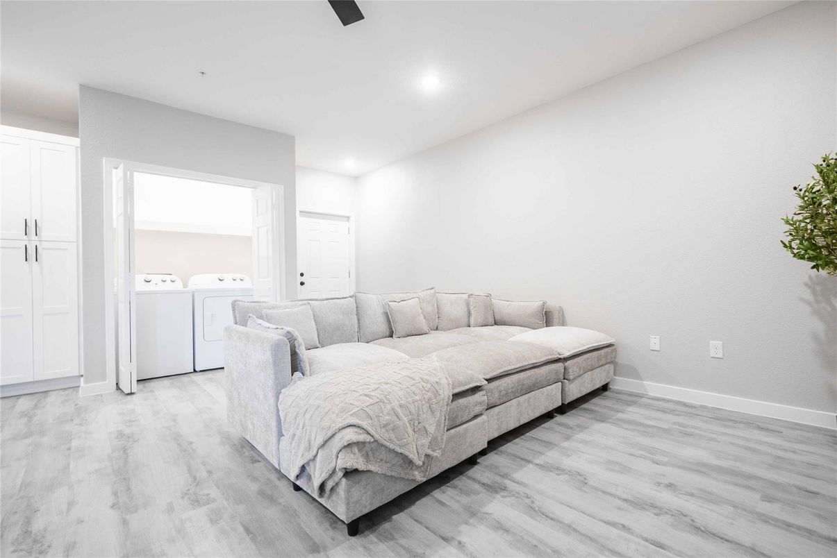 Bedroom, Interior, Recessed Lighting, Washer, Wood Texture Flooring