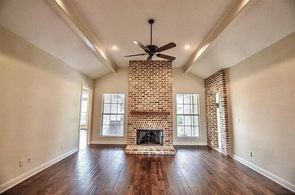 Empty room, Fireplace, Interior, Recessed Lighting, Stone Walls, Wood Texture Flooring