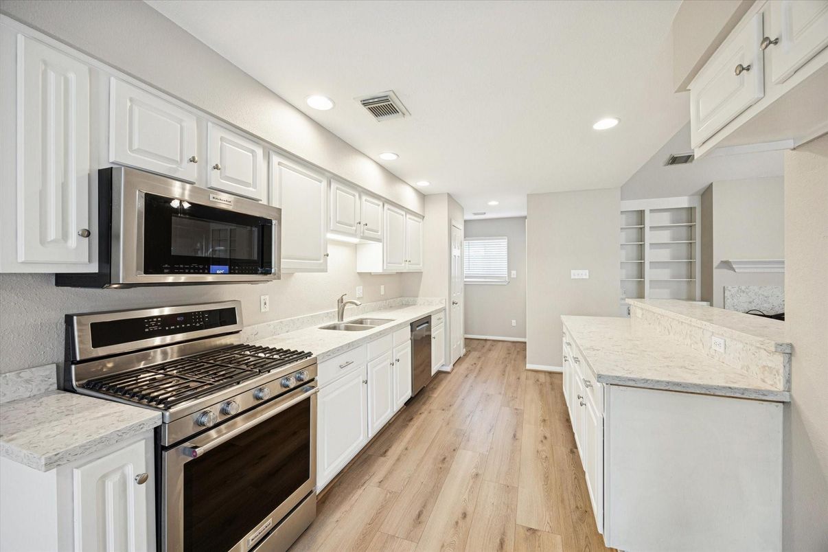 Interior, Kitchen, Recessed Lighting, Stainless Steel Appliances, Wood Texture Flooring