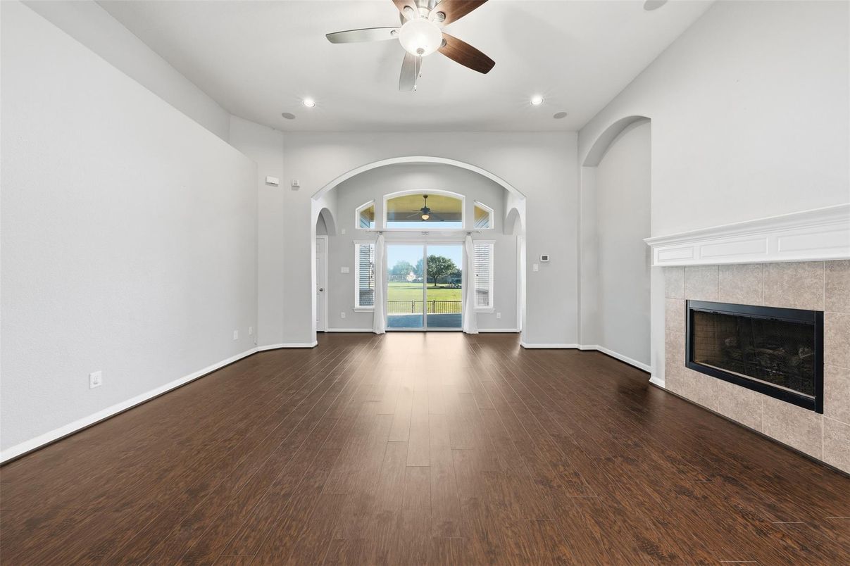 Empty room, Fireplace, Interior, Recessed Lighting, Wood Texture Flooring