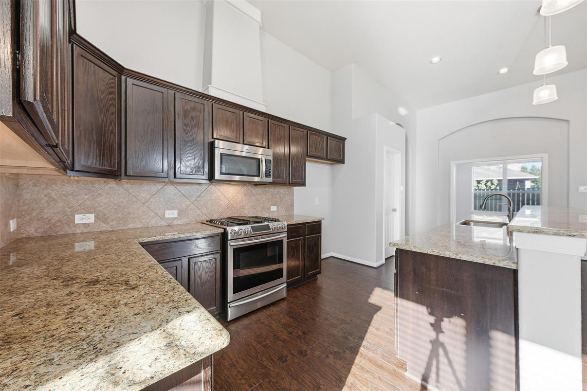 Interior, Kitchen, Pendant Lights, Recessed Lighting, Stainless Steel Appliances, Wood Texture Flooring
