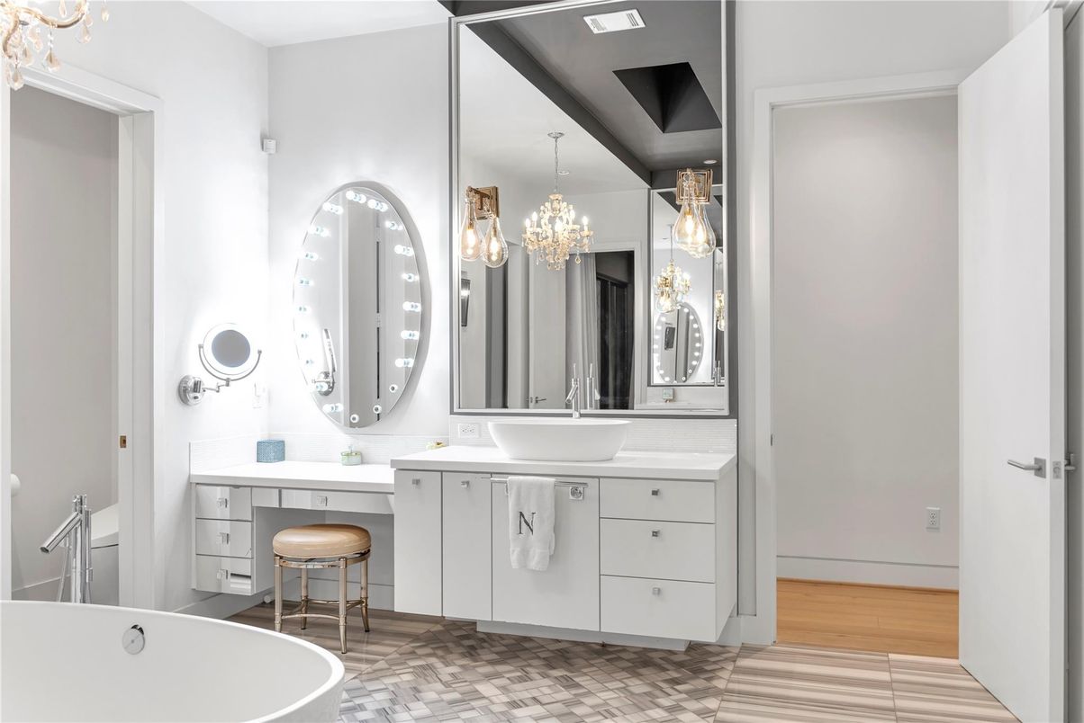 Bathroom, Chandelier, Dual Sink Vanities, Interior, Wood Texture Flooring