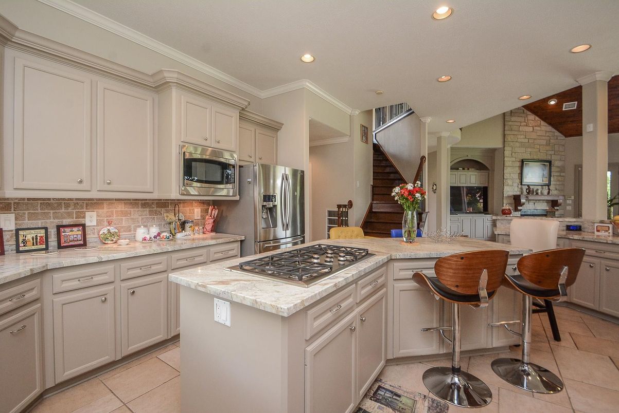 Interior, Kitchen, Recessed Lighting, Stainless Steel Appliances, Stone Walls