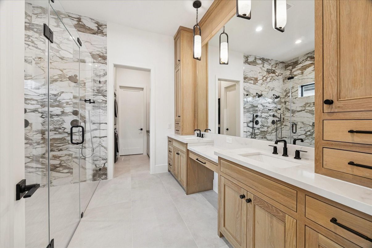Bathroom, Dual Sink Vanities, Glass Shower, Interior, Marble Walls, Pendant Lights, Recessed Lighting