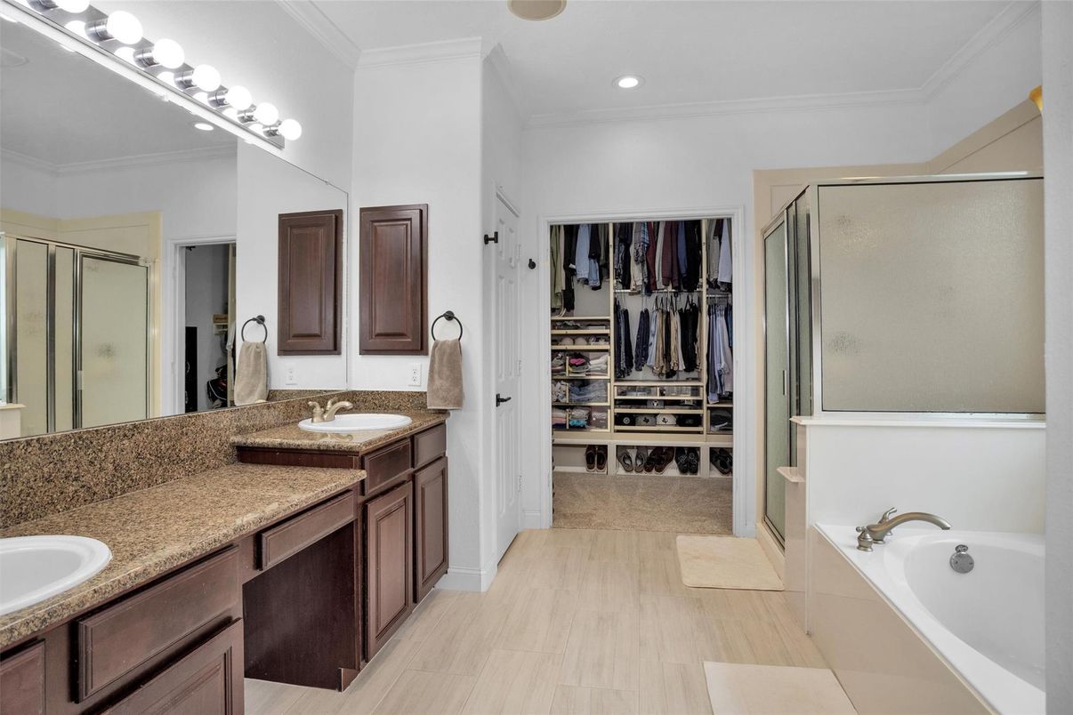 Bathroom, Dual Sink Vanities, Interior, Recessed Lighting, Walk-in Closets, Wood Texture Flooring